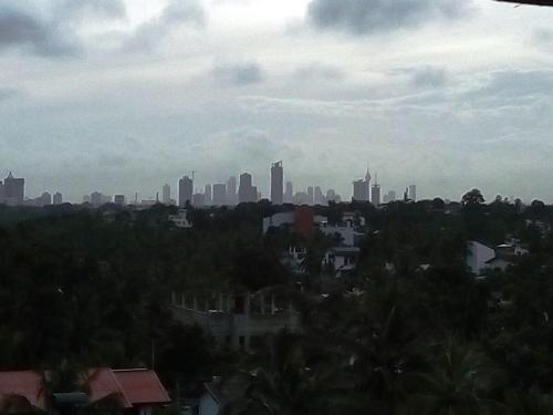 a view of a city with a city skyline at Mystical Rose in Malabe