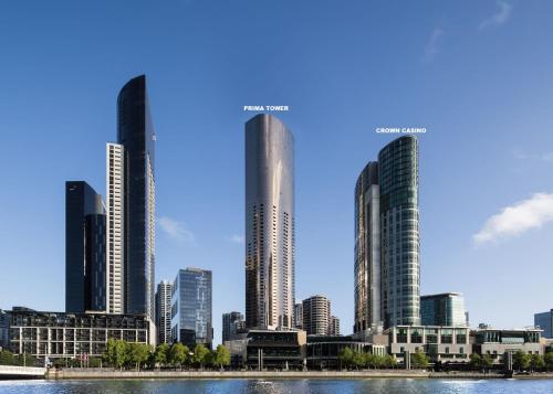 a rendering of a city skyline with tall buildings at Prima Tower - Premium Apartment with City and Flames Views in Melbourne