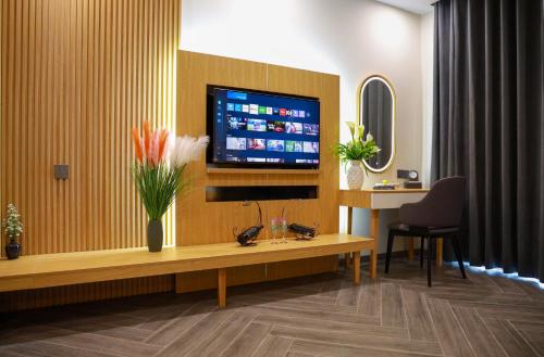 Televisyen dan/atau pusat hiburan di Daystar Hotel
