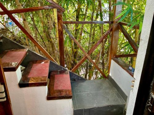 a view from the inside of a building with trees at Apartamento de lujo arriba de la playa con acceso directo al mar in Veracruz