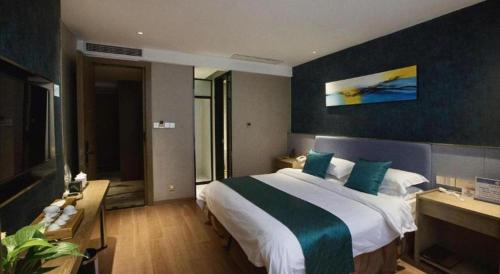 Letto o letti in una camera di Southeast Peninsula Hotel Quanzhou
