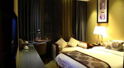 Letto o letti in una camera di Southeast Peninsula Hotel Quanzhou