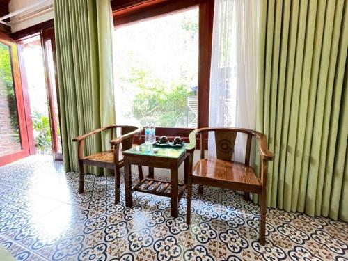 Φωτογραφία από το άλμπουμ του Tam Coc Camellia Garden Homestays σε Νιν Μπιν