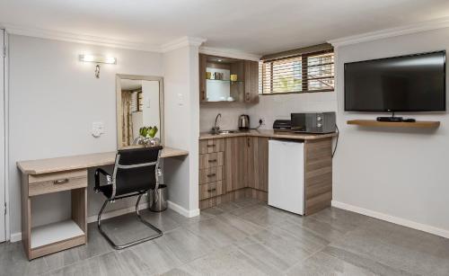 Η κουζίνα ή μικρή κουζίνα στο Bhotani Lodge