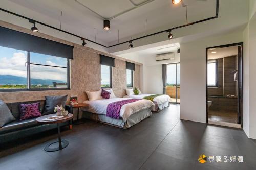 Ένα ή περισσότερα κρεβάτια σε δωμάτιο στο 幸福時潮旅宿本館l宜蘭包棟民宿依人數開房