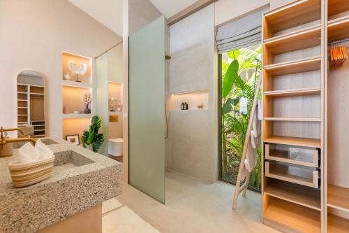 a bathroom with a shower and a sink at Rosa Del Mar Seaview Villa with gym in Ban Nong Chaeng