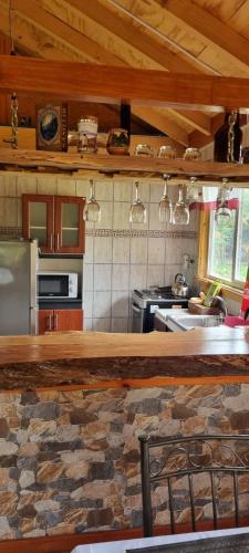 Nhà bếp/bếp nhỏ tại Cabaňa a pasos del lago