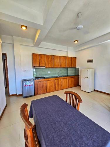Η κουζίνα ή μικρή κουζίνα στο Galle Stay residence