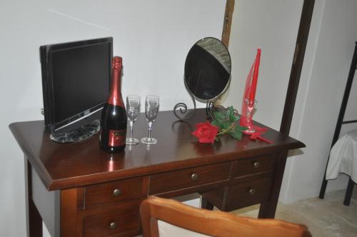 TV a/nebo společenská místnost v ubytování Masseria Costanza