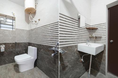 a bathroom with a toilet and a sink at FabHotel Royal Suites I in Bengaluru
