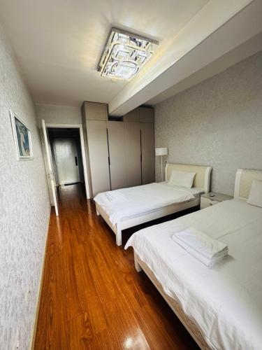 Una cama o camas en una habitación de Oni's guest house