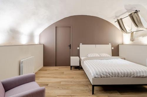 Кровать или кровати в номере Appartement spacieux avec grande terrasse cœur de Valence