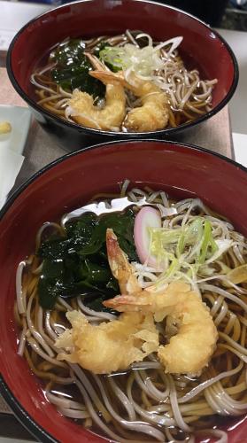 two bowls of food with shrimp and noodles on a table at コスタリゾート茅ヶ崎大人専用 in Suka