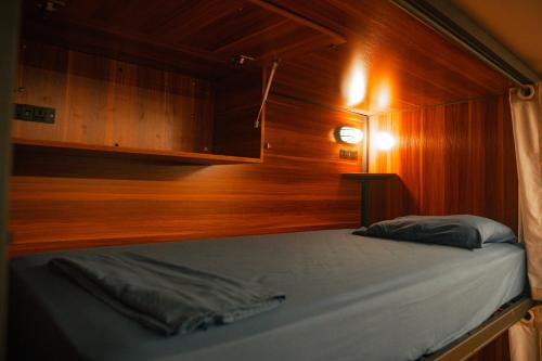Cama o camas de una habitación en El Machico Hostel