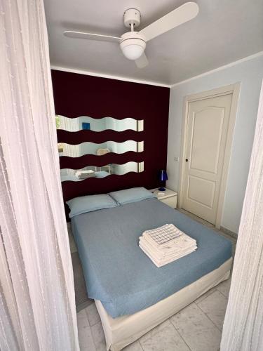 En eller flere senge i et værelse på Montecarlo View