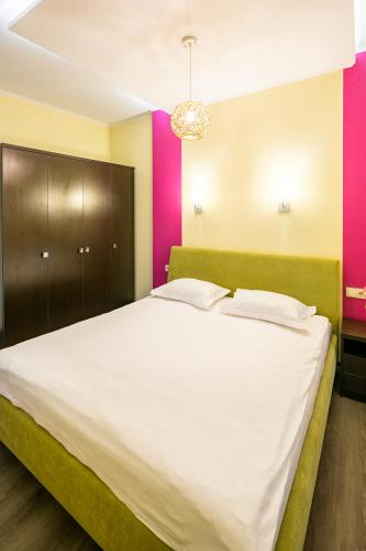 Postel nebo postele na pokoji v ubytování Apartment Fedkovycha