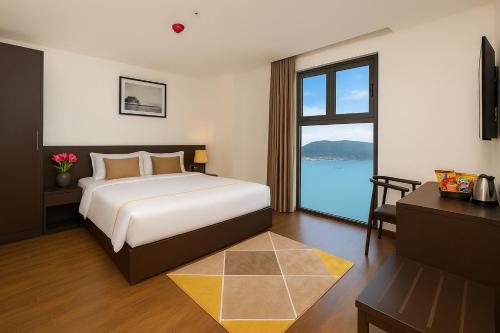 Ένα ή περισσότερα κρεβάτια σε δωμάτιο στο Meriton Hotel Nha Trang