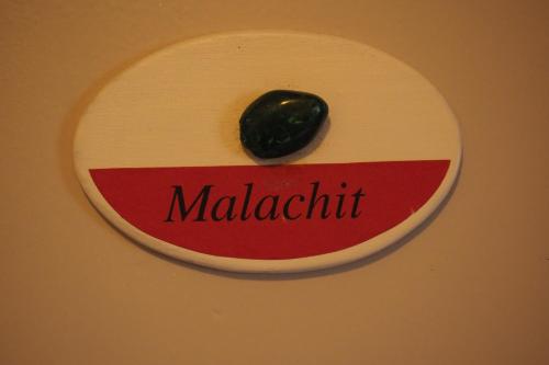 a sign with a green pepper on top of it at Frauenpension Arleta - Women only in Goslar