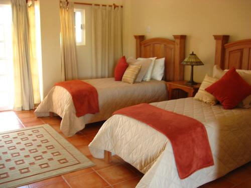 Una cama o camas en una habitación de Serenity Sands