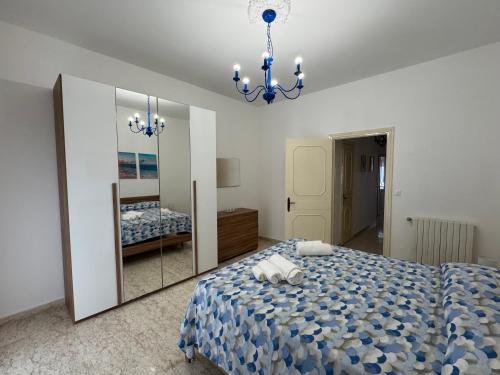 En eller flere senge i et værelse på La dimora di Traiano