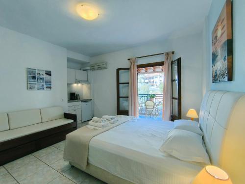 Кровать или кровати в номере Anna Maria - Vanessa Apartments
