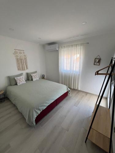 Ένα ή περισσότερα κρεβάτια σε δωμάτιο στο Montesinhos
