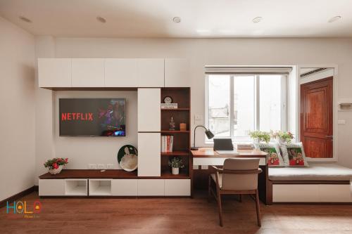 TV o dispositivi per l'intrattenimento presso HoLo Central Hanoi - Serviced HomeStay
