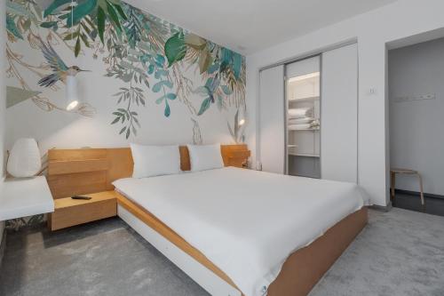 Un pat sau paturi într-o cameră la Citadel Hideaway
