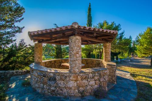 a stone walledificialificialificialificialificialificialificialificialificialificialificialificial at Elatia Villa in Volimes