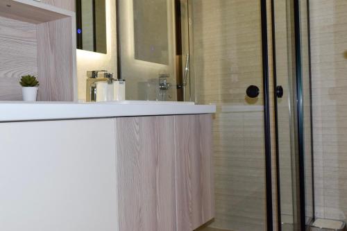 Koupelna v ubytování Modena Resort Spa & Wellness Zlatibor