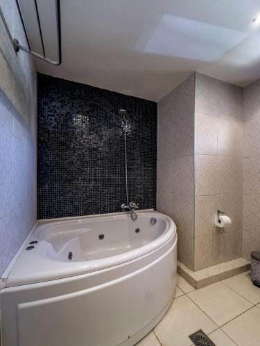 Koupelna v ubytování Niriides Luxury Villas