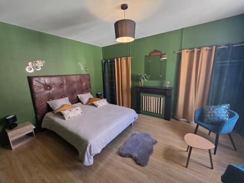 Postel nebo postele na pokoji v ubytování Couleurs Nature