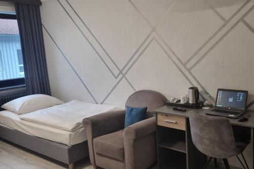 Ένα ή περισσότερα κρεβάτια σε δωμάτιο στο Mercure Hotel Ingolstadt