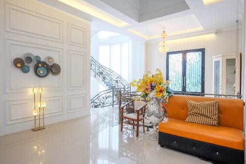 Χώρος καθιστικού στο Urbanview Hotel Trisna Tulungagung