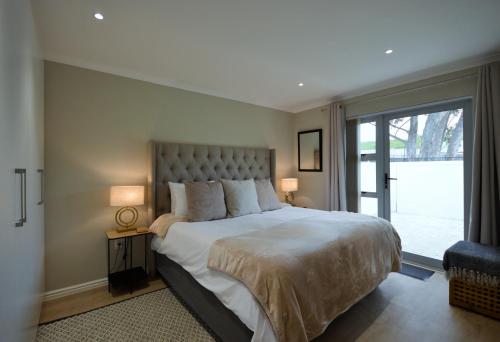 Giường trong phòng chung tại Montblanc Cottage