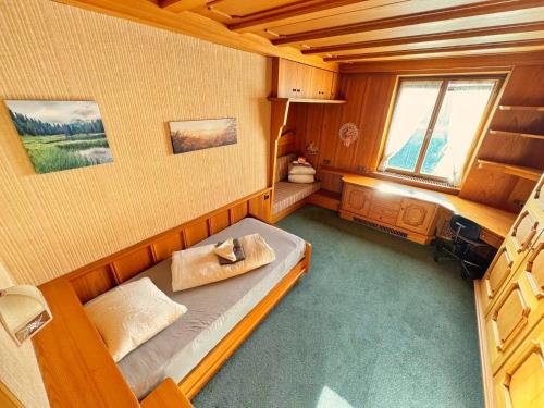 Кровать или кровати в номере Vintage Tirol Apartment