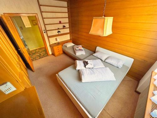 Кровать или кровати в номере Vintage Tirol Apartment