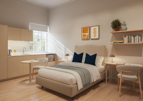 Ένα ή περισσότερα κρεβάτια σε δωμάτιο στο The Exhibition