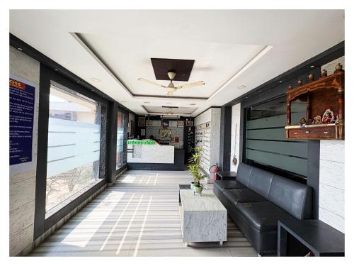 a corridor of a restaurant with a ceiling at BIG বিগ বস Boss Front The New Digha Sea Beach in Digha