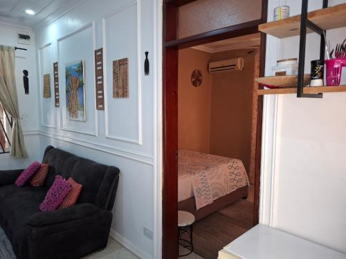 Coin salon dans l'établissement BabaJay Family Home