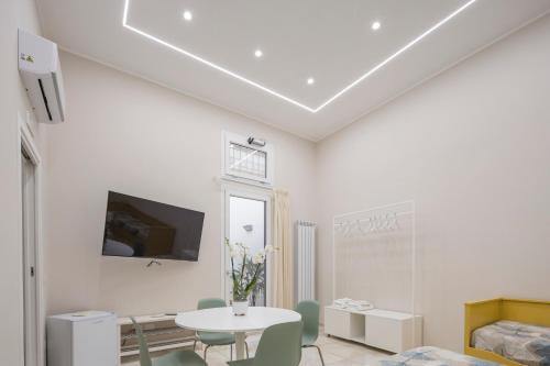 TV a/nebo společenská místnost v ubytování MiniApartment alCorso