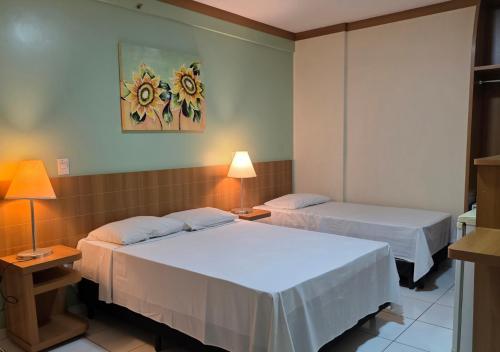 Postel nebo postele na pokoji v ubytování Golden Dolphin Grand Hotel - Suite frente Piscinas