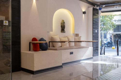 a room with a couch with vases on it at Duck Otel in Istanbul
