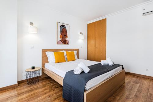 Postel nebo postele na pokoji v ubytování Encosta do Vau