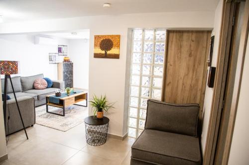 Zona de estar de Cozy Like Home
