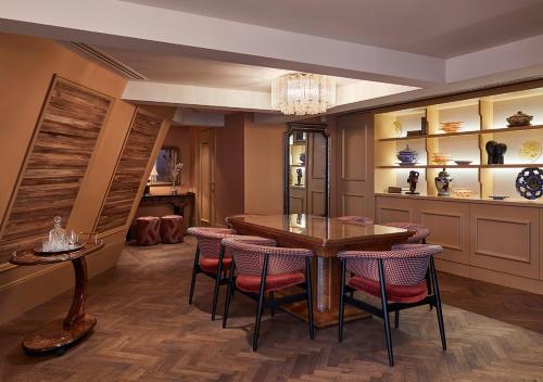 a dining room with a table and chairs at De L’Europe Amsterdam – The Leading Hotels of the World in Amsterdam