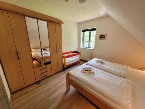 Postel nebo postele na pokoji v ubytování Premiumwohnung im Biosphärenreservat