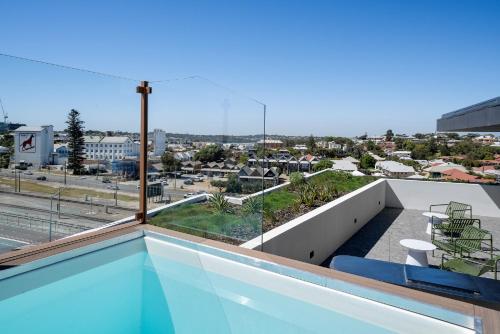 a balcony with a view of a city at Spacious 2-Bed Apartment in North Fremantle in North Fremantle