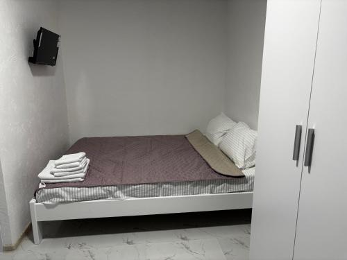 Ένα ή περισσότερα κρεβάτια σε δωμάτιο στο NomeruOdesa