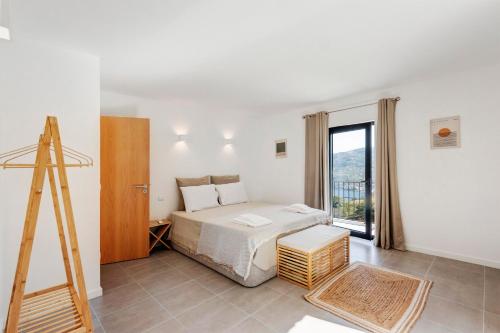 Postel nebo postele na pokoji v ubytování Casa Do Alago